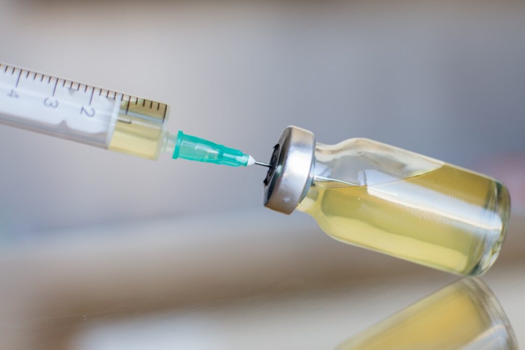 A syringe in the process of drawing a B12 vitamin injection. These types of injections can jump-start weight loss in Fargo when used in an expert-guided weight loss program.