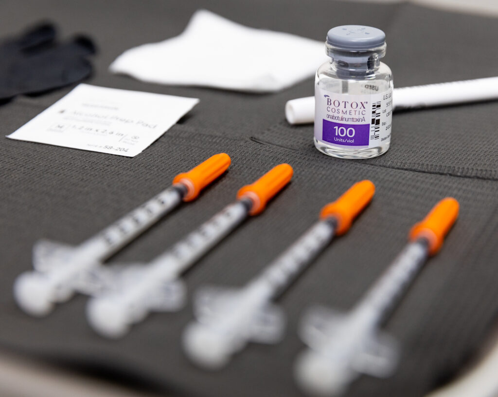 A close-up image on the syringes and vials of Botox in Fargo, used during injection treatments.